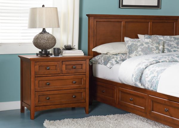 McKenzie 4-Drawer Nightstand in pecan finish shown in bedroom set