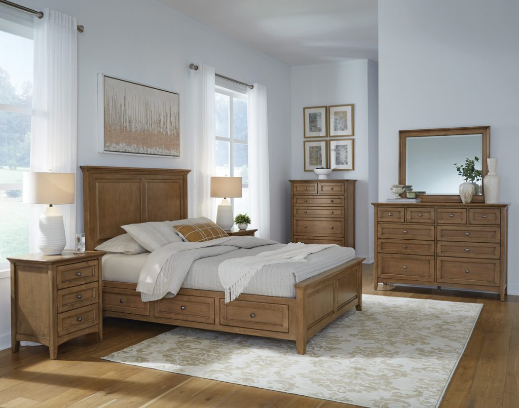 McKenzie 3-Drawer Nightstand in pecan finish shown in bedroom set