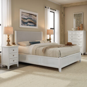 McKenzie Queen Upholstered Panel Bed in snowbound finish shown in bedroom set